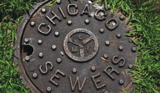 Manhole cover labeled "Chicago Sewers"